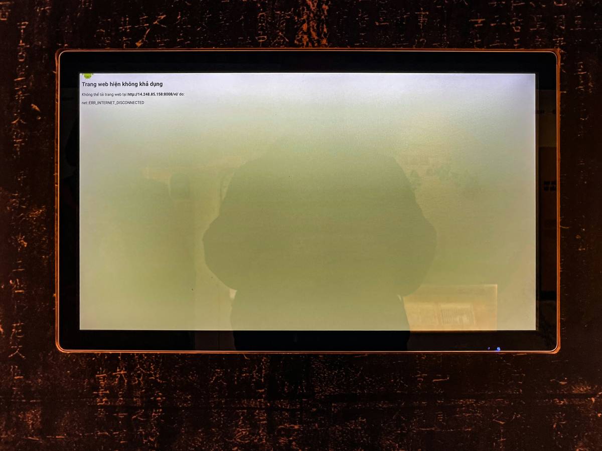Close-up of a gaming tablet showing tablet screen burn-in with persistent HUD elements around the edges