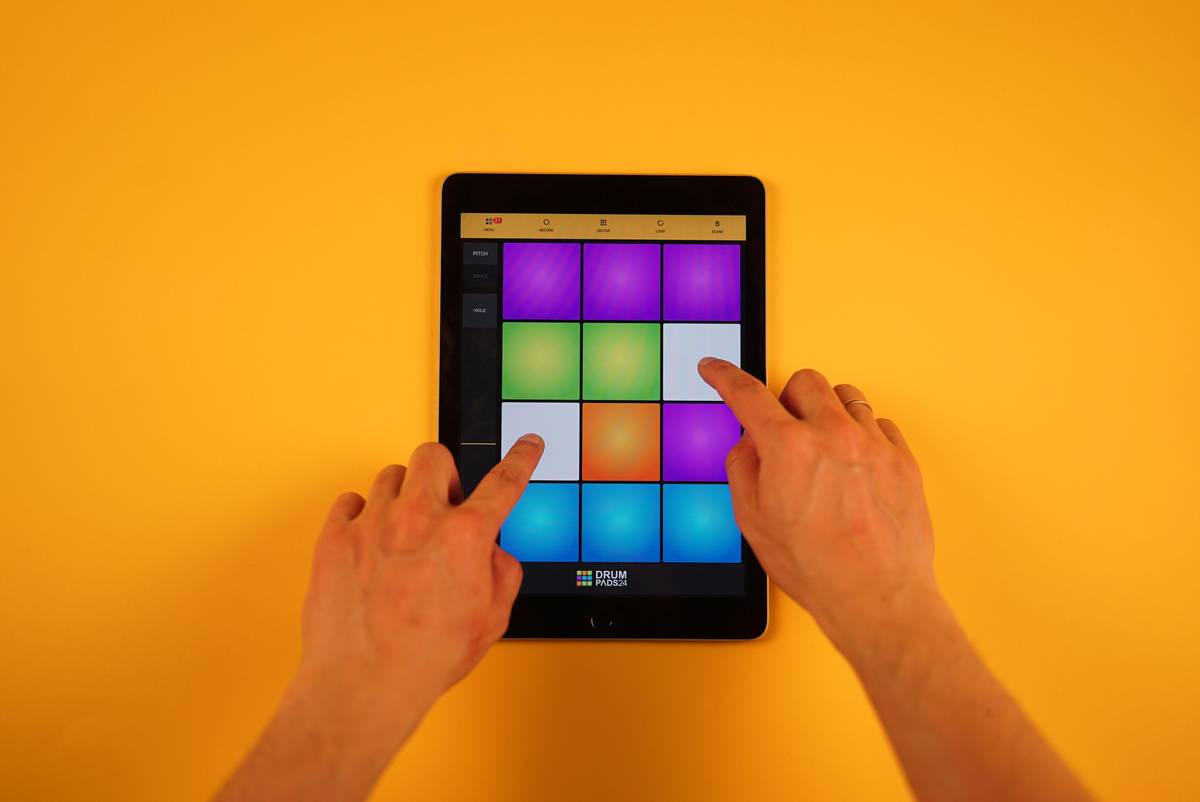Best tablet game mods shown on a Samsung Galaxy Tab running a modified version of a popular action game with enhanced graphics and unlimited ammo